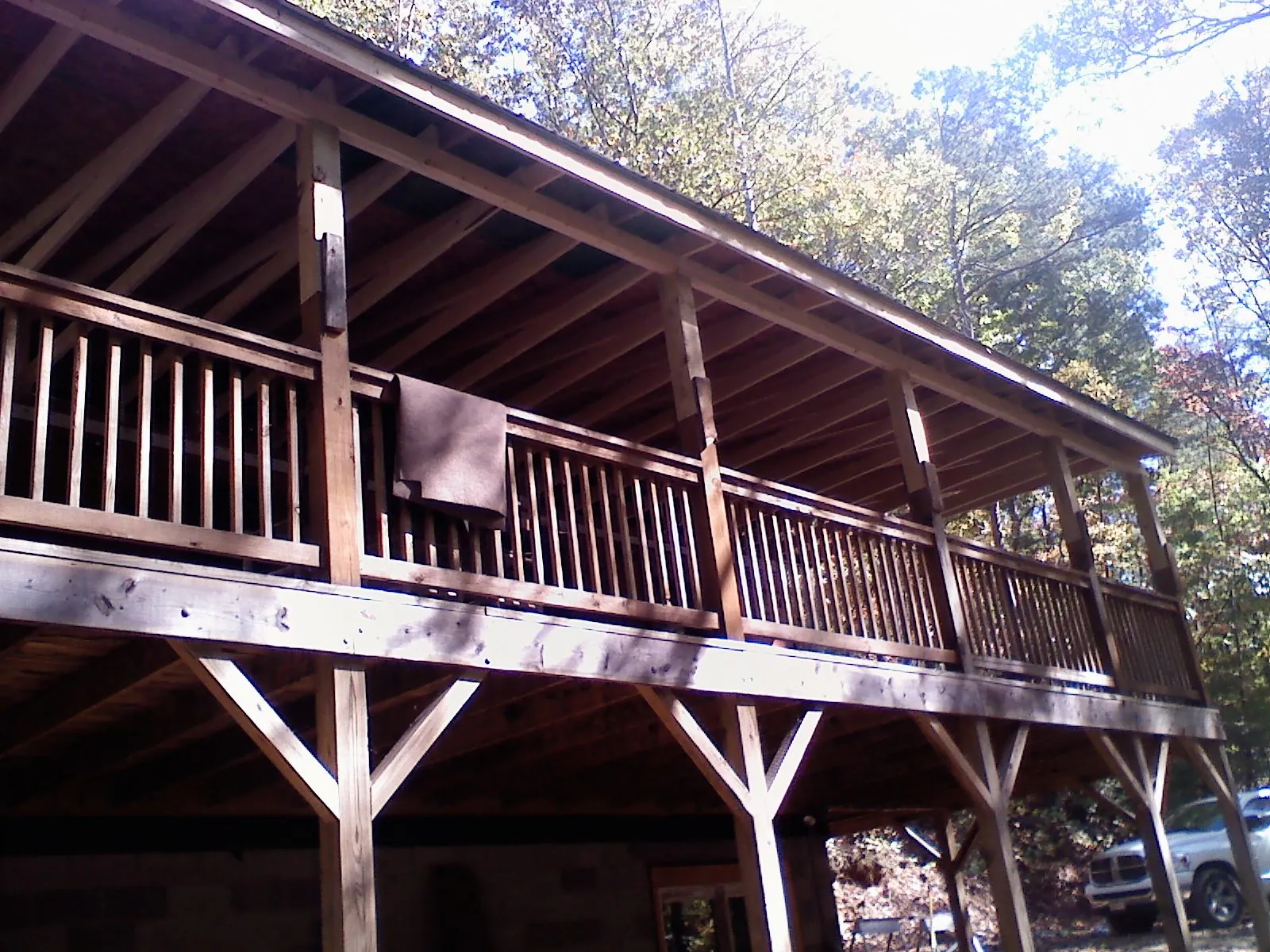 Timber framing under a new elevated porch and deck — Roof Leak Repair in Port Henry by Roofing Brothers